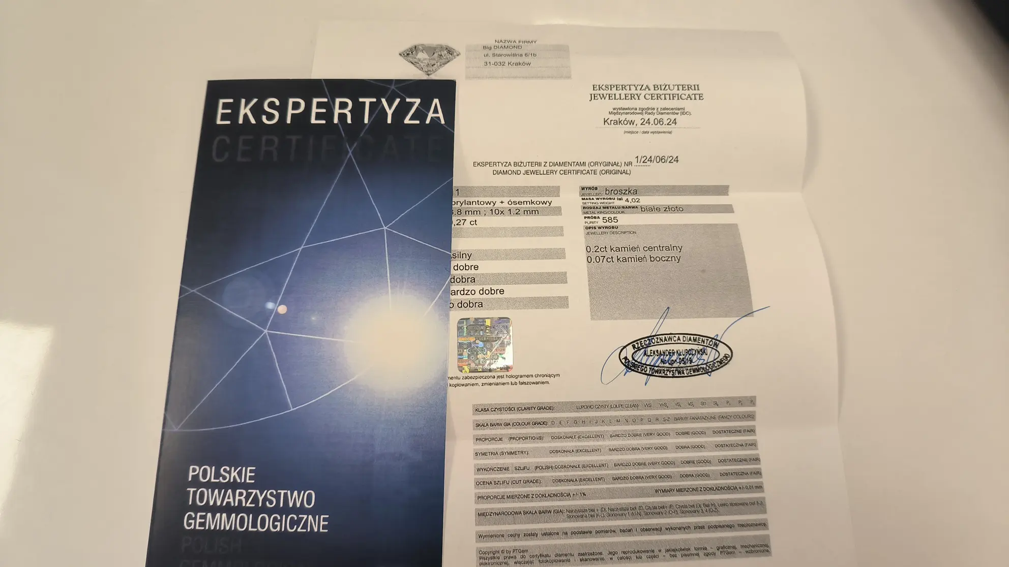 Certyfikat autentyczności biżuterii wydany przez Jubiler Kraków BigDIAMOND, z informacjami o czystości, karacie i szlifie kamieni szlachetnych